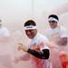 Color Run participants are bombarded with colored powder on Saturday, May 11. Daniel Brenner I AnnArbor.com